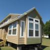 The Eagles Landing model P-535 by Platinum Cottages in Malakoff TX and RRC Athens. Shown with optional Clerestory windows and a front double window box bay.