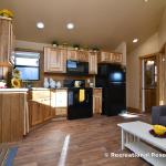 The Premier cabin by Platinum Cottages and Recreational Resort Cottages Athens. This value priced 15' wide park model is shown with cabin features including stained exterior hardi, and interior stained syp trim and accents.